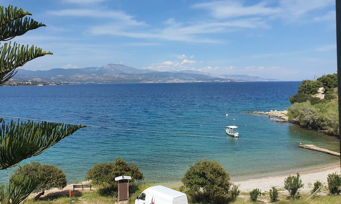 Loutra Oraias Elenis Apartment | Beachside Bliss at Ericas Heaven - Pet-Friendly & Pool Access