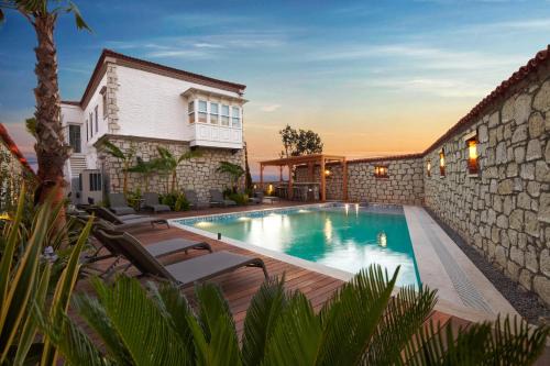 Alacati Hotel | Tranquil Eritrina Alacati: Oceanfront Pool & Dining Awaits