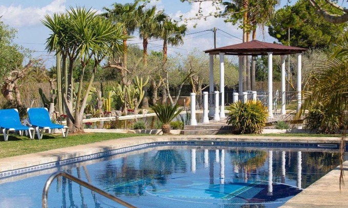 Binissalem House | Discover Es Rasquell: 4-Star Poolside Paradise for Families