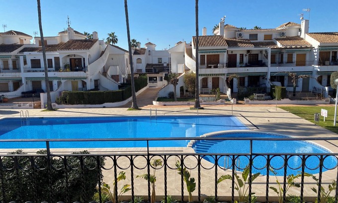 Torre de la Horadada House | Inviting Bungalow with Poolside Terrace and Ocean Views