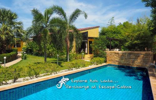 Ko Lanta Apartment | Oceanfront Escape-Cabins with Pool & Family-Friendly Vibes