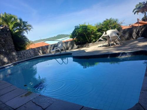 Praia dos Anjos House | Escape to Paradise: Poolside Oasis Steps from the Beach