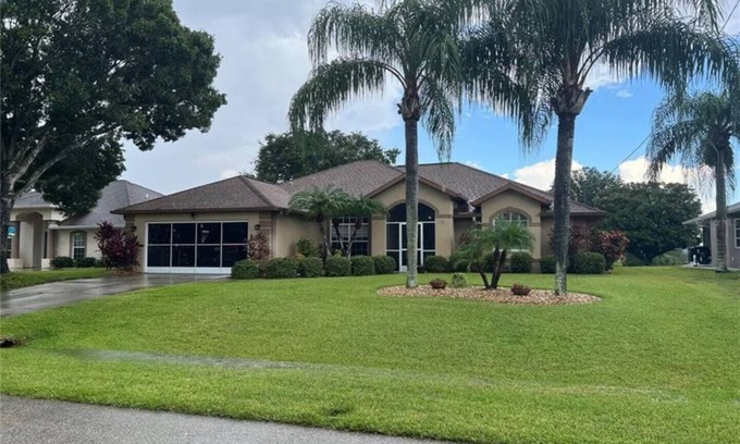Broadmoor House | Escape to our stunning waterfront vacation rental pool home in Rotonda West, FL