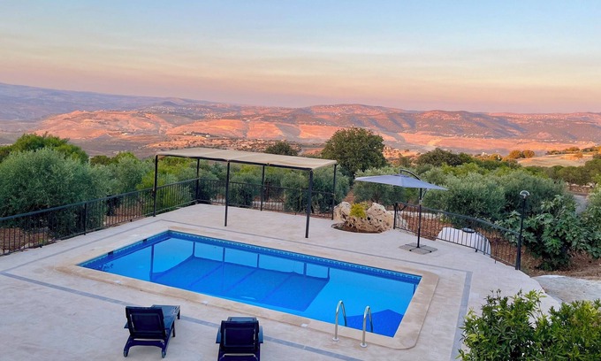 Zayy Other | Escape to Zai Zaman Villa—stunning views, rustic charm, and a breathtaking pool.