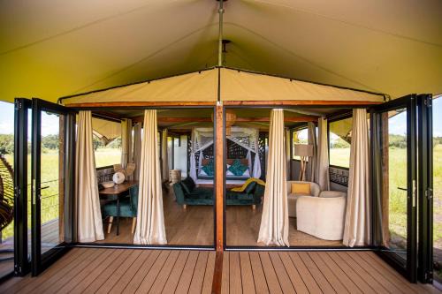 Ikoma Hotel | Experience Escarpment Serengeti Camp: 5-Star Luxury Retreat