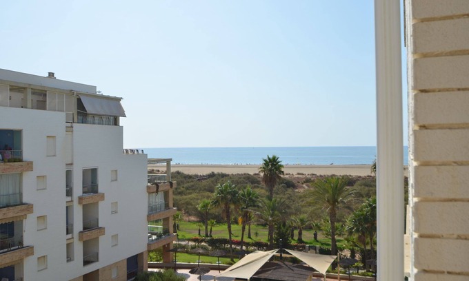 Punta del Moral Apartment | Espigon Central 11: Pet-Friendly Apartment with Pool Access
