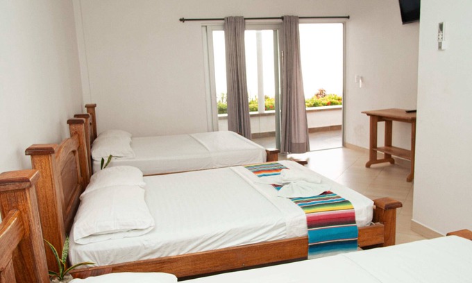 Covenas Hotel | Cozy Balcony Rooms Near Coveñas Beach with Pool & Breakfast