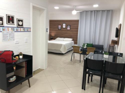 Pitangueiras Apartment | Modern Studio Steps from the Beach with Free Wi-Fi & Garage
