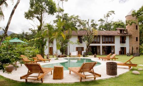 Camburi House | Cozy Estalagem Camburi: Ocean Views & Family-Friendly Fun