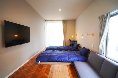 Niijima House | Relax at Etcetera Niijima Nagisa Building - Family-Friendly Stay