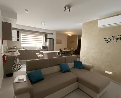 Qawra Apartment | Discover Eureka Mansions: Relax by the Pool in Style