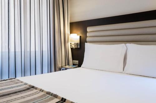Heliopolis Hotel | Explore Silken Al-Andalus Palace with Pool & Ocean Views