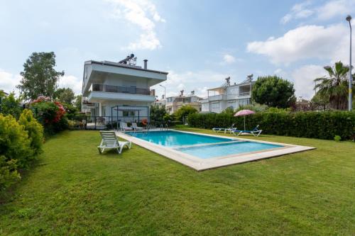 Bogazkent Villa | Relaxing EV Apartments with Ocean Views and Pool Access