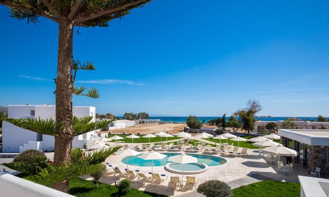 Plaka Apartment | Experience Evdokia: Oceanfront Stay with Pool & Spa
