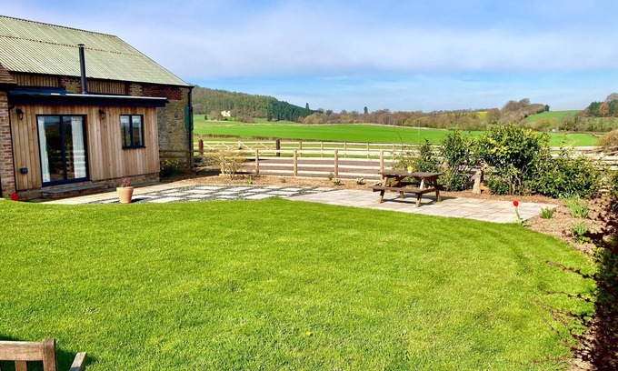 Eaton Mascott Cottage | Evenwood Byre: Ideal Retreat for 4 with Family-Friendly Perks