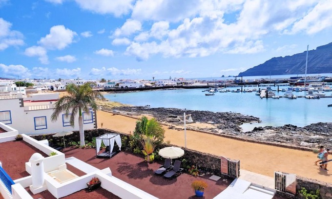 Caleta de Sebo Apartment | Oceanfront Evita Beach Suites with Exceptional Guest Ratings