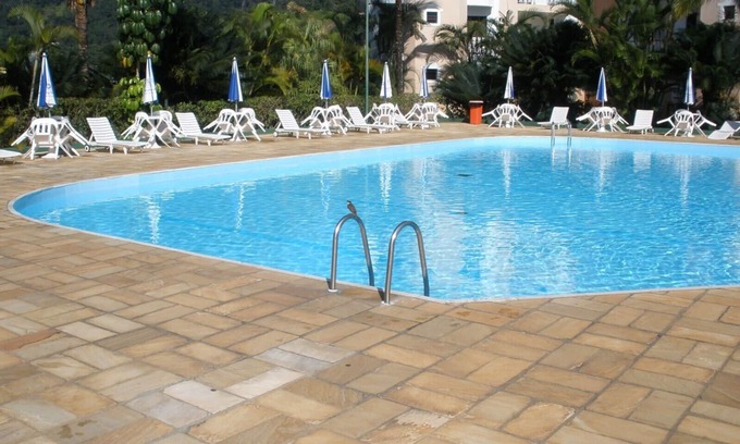 Toninhas Apartment | Premier Apartment Steps from Porpoises Beach with Ocean View