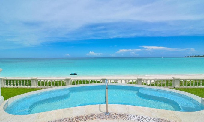 Old Fort Bay Villa | Exclusive Beachfront Mansion with Pool and Hot Tub
