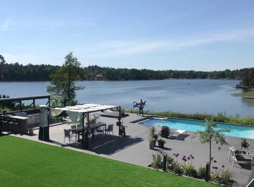 Tyreso Villa | Elegant Lakefront Mansion in Stockholm with Pools & Spa