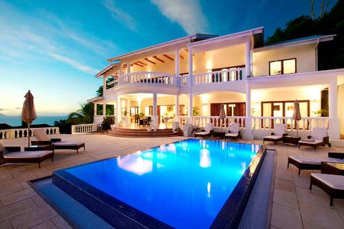 Glacis Villa | Exclusive Oceanfront Retreat with Pool & Family-Friendly Amenities