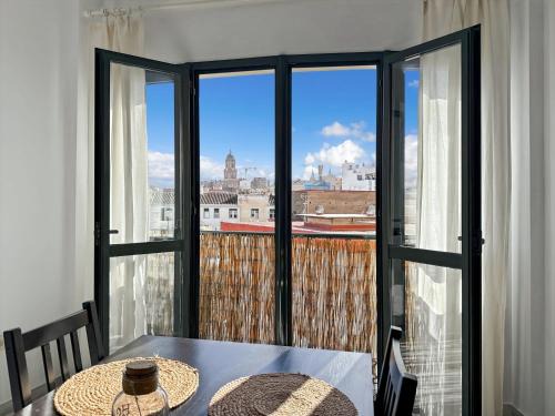 La Goleta Apartment | Inviting Malaga Apartments with Cathedral Views & Auto Check-in