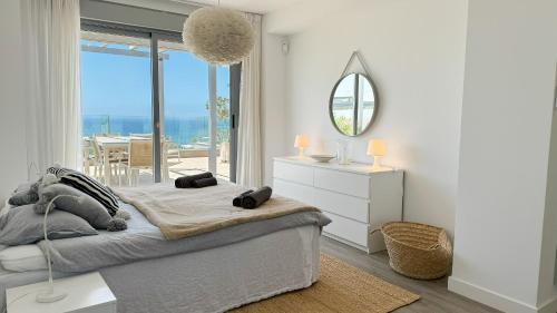 Marbella Apartment | Oceanfront Penthouse Cabopino with Pool and Child-Friendly Perks