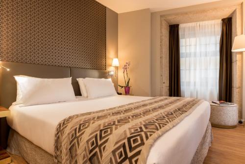Centro / Baixa Hotel | Discover Exe Almada Porto: 4-Star Family-Friendly Stay