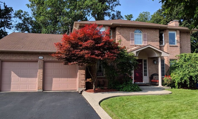 Burlington House | Executive Family Home with Inviting Backyard Oasis