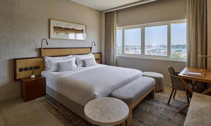 Abu Dhabi Apartment | Executive Suite with Oceanfront Pool by Khor Al Maqta Park