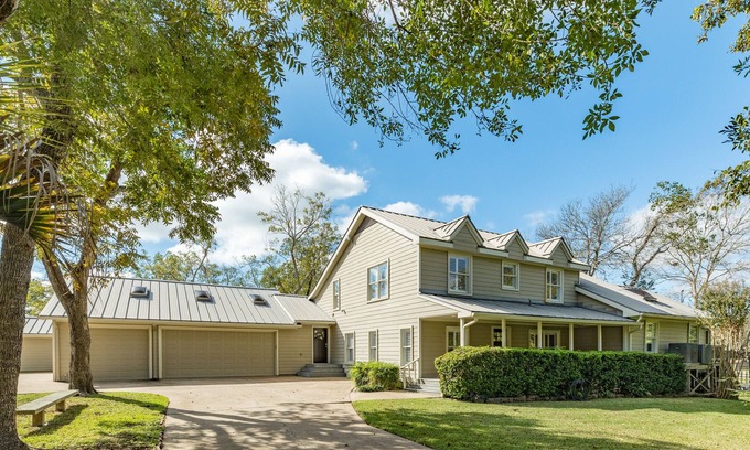 Dickinson House | Expansive home on the water with dock, large deck, shared pool & central AC