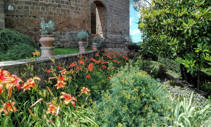 Proceno Apartment | Discover a Castle Retreat with Ocean Views and Spa Amenities
