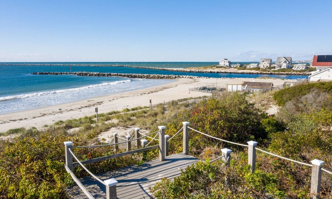 Jerusalem House | Paradise Awaits: Oceanfront Retreat with Pet-Friendly Perks