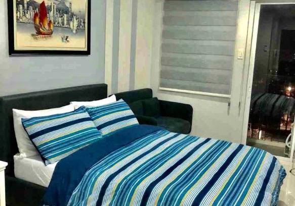 Bacolod Apartment | Explorer Suite 1004: Top-Rated Stay with Pool & Breakfast