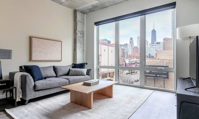 Killgubbin Apartment | Stylish River North 1BR with Sky Terrace & Yoga Studio