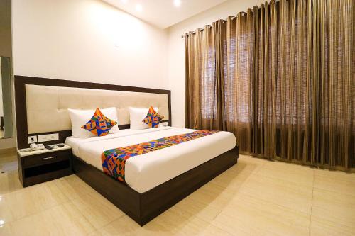 Sushant Lok Hotel | Budget-Friendly FabHotel Oyster Villa with Breakfast & Kids' Play