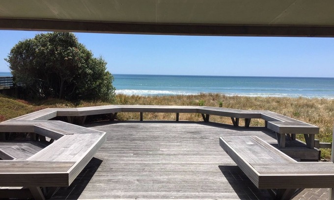 Pukehina House | Stylish Beach Bach with Oceanfront Views & Spa Amenities