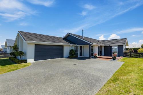 Wharewaka House | Family-Friendly Retreat at Wharewaka Holiday Home