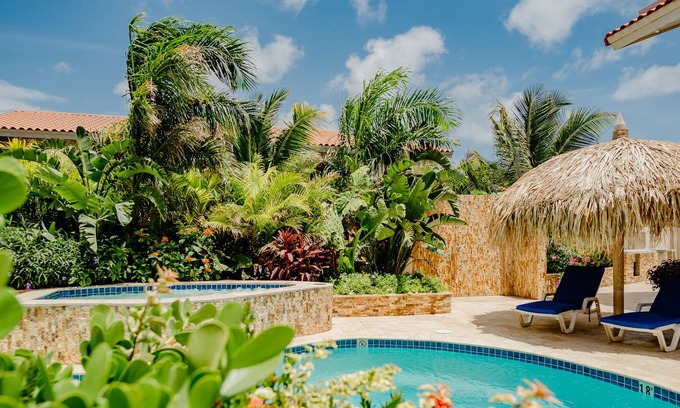 Bubali Apartment | Fabulous modern 2-bedroom apartment with tropical garden, pool and whirlpool