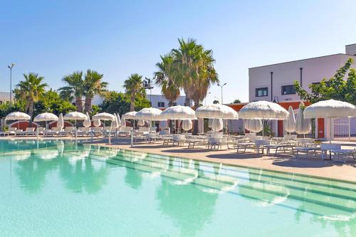 Porto Cesareo Apartment | Discover Falco Beach House - Oceanfront Retreat with Pool