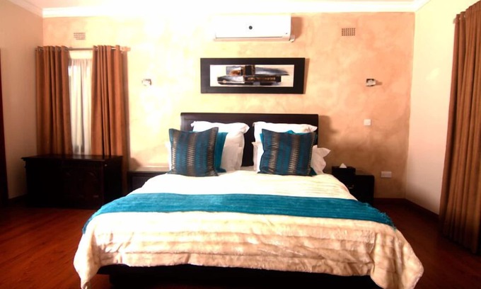 Lusaka Villa | Relaxing Fallsway Villas: Ocean Views & Private Pool Await