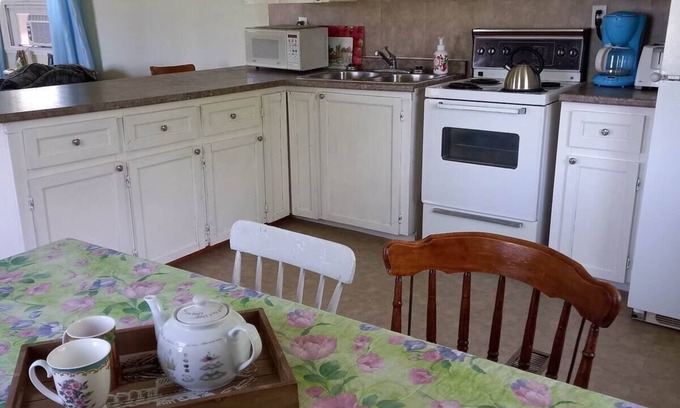 Central Bedeque House | Cozy Family Cottage with Fire Pit Steps from the Beach
