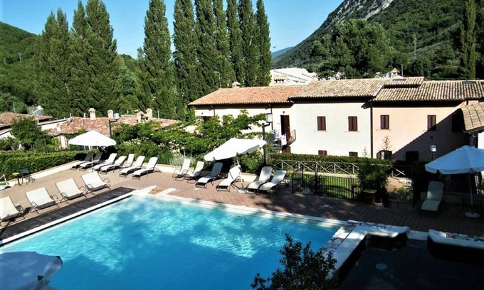 Foligno House | Relax at Belvilla by OYO: Poolside Retreat for Families