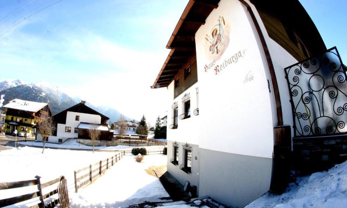 Seefeld in Tirol Apartment | Family-Friendly Chalet with Central Location & Mountain Views