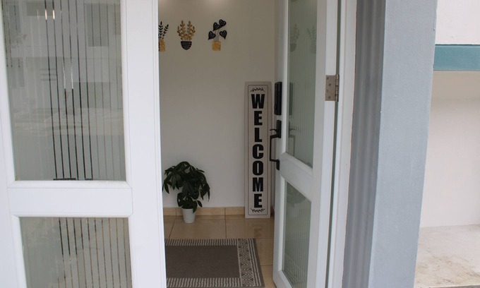 Distrito Central de Bayamon House | Guest Rated 10/10: Family-Friendly Oasis with Ocean View