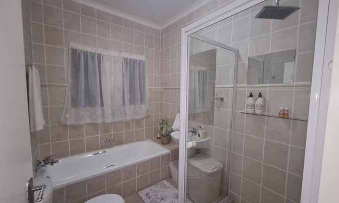 Greater Johannesburg Metropolitan Area House | Family-Friendly Three-Bedroom Townhouse in Midrand