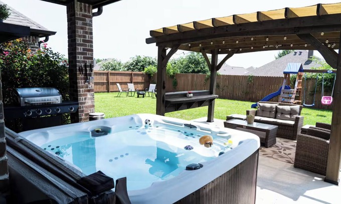 Tyler House | Family Fun 3BR Getaway with Hot Tub and Play Yard