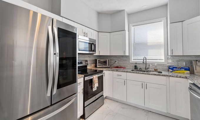 Norfolk House | Perfect Family Beach House with Spa & Hot Tub Amenities