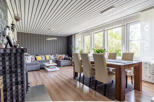 Parnu House | Inviting Villa with Garden and Oceanfront Views