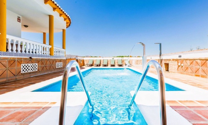 Alcaucin Villa | Family-Friendly Chalet with Pool and Ocean Views Await