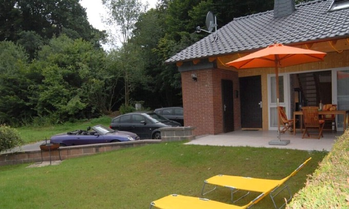Wrexen House | Fantastic Holiday home with jacuzzi and fireplace at the border of a wood